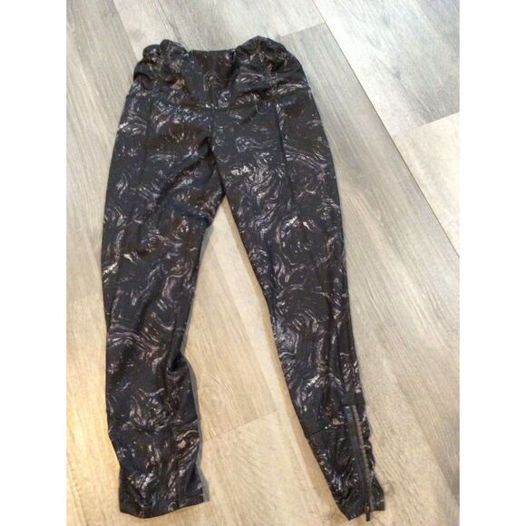 Lululemon athletica Size 4 womens leggings black print leg zippers - Picture 1 of 6